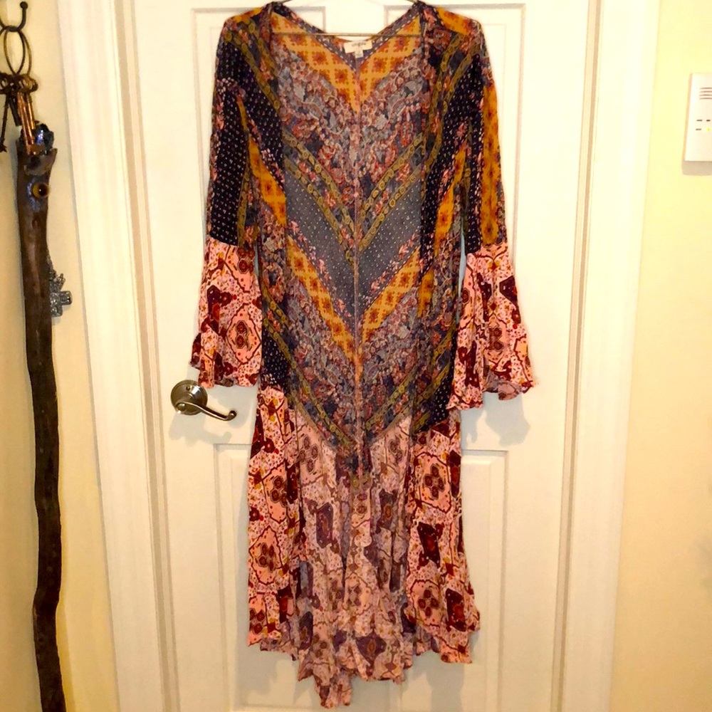 Unique lengthy cardigan/ open front